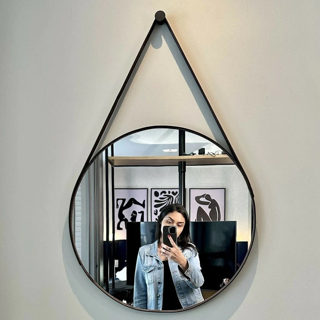 Miroir Adnet en cuir.